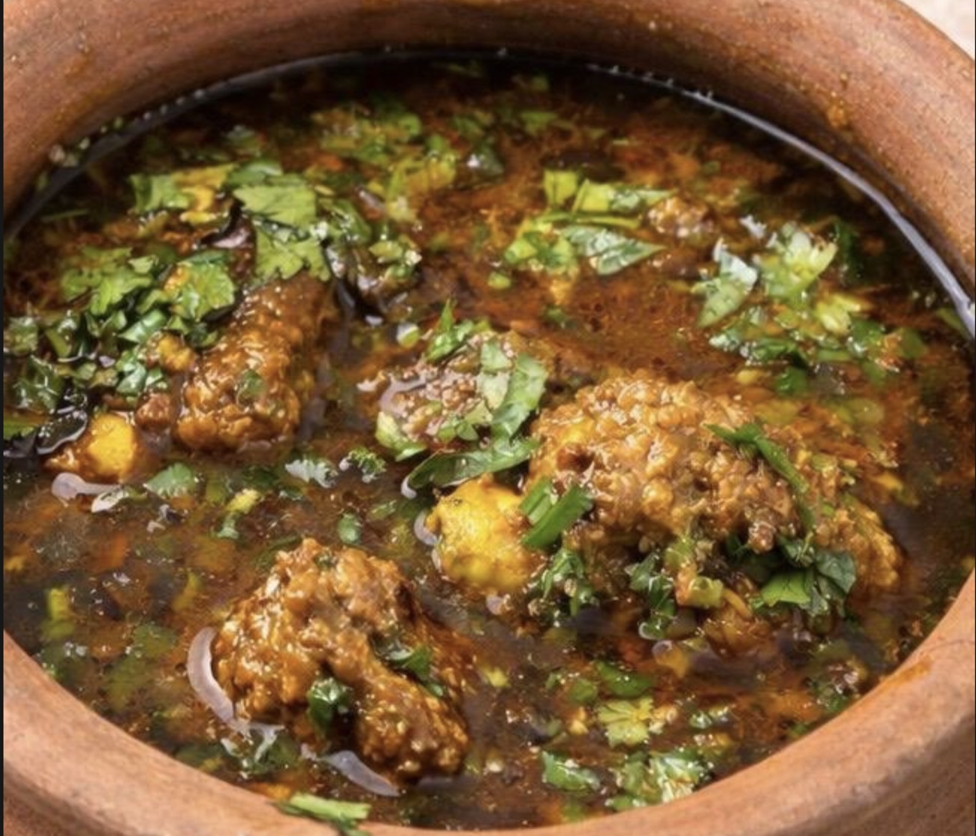 Bihari-style curry in an earthen pot